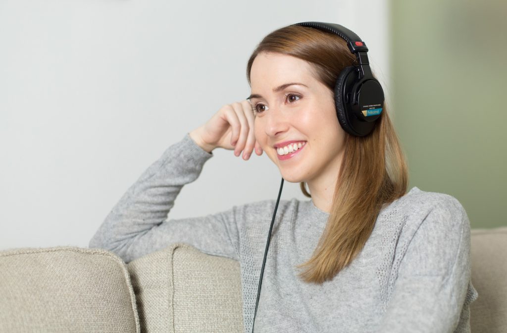 woman listening to book